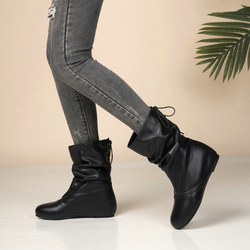 Hidden wedge heels back tie-up mid calf slouchy boots