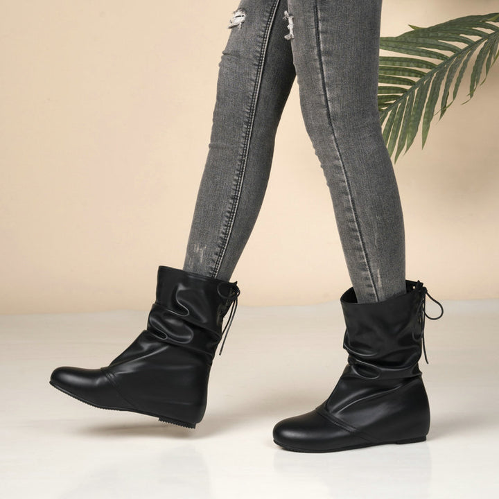 Hidden wedge heels back tie-up mid calf slouchy boots