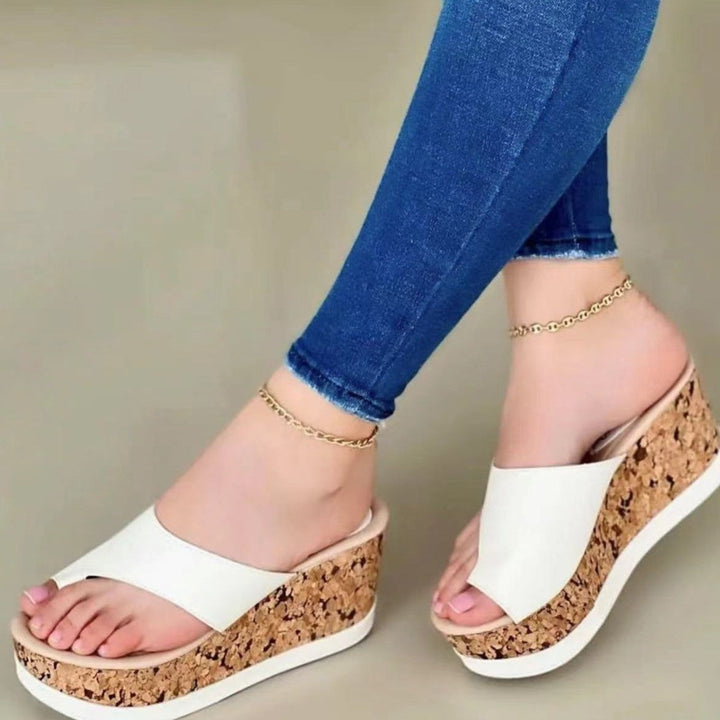 Toe ring wedge heels slides