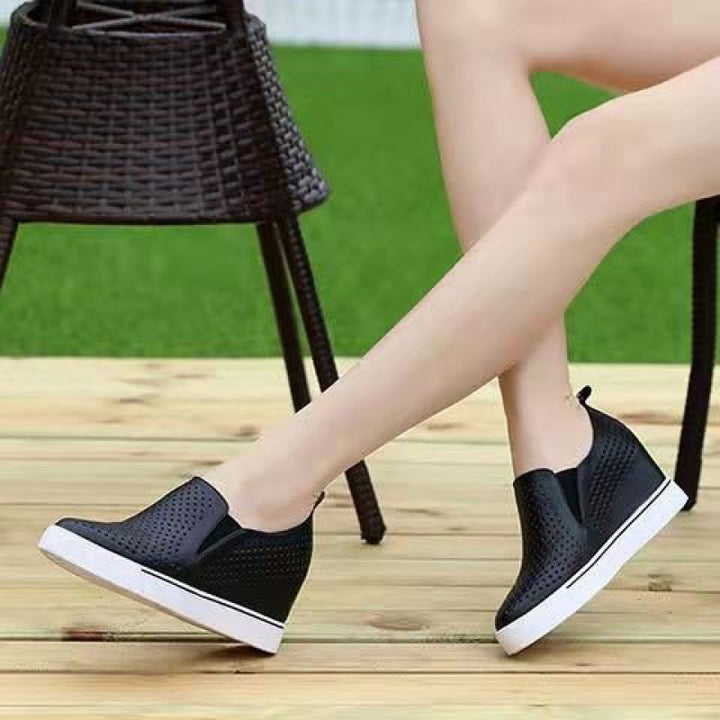 black Women's Perforated Slip-On Wedge Sneakers