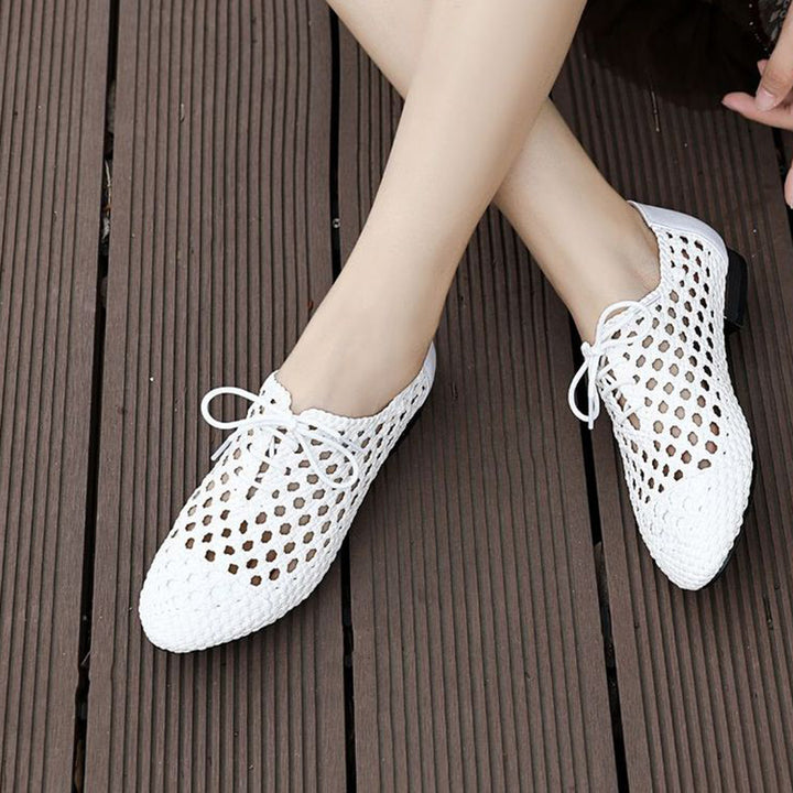 white Women's hollow woven lace-up loafers
