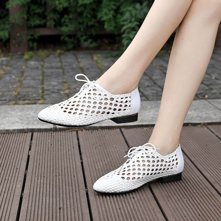 white Women's hollow woven lace-up loafers