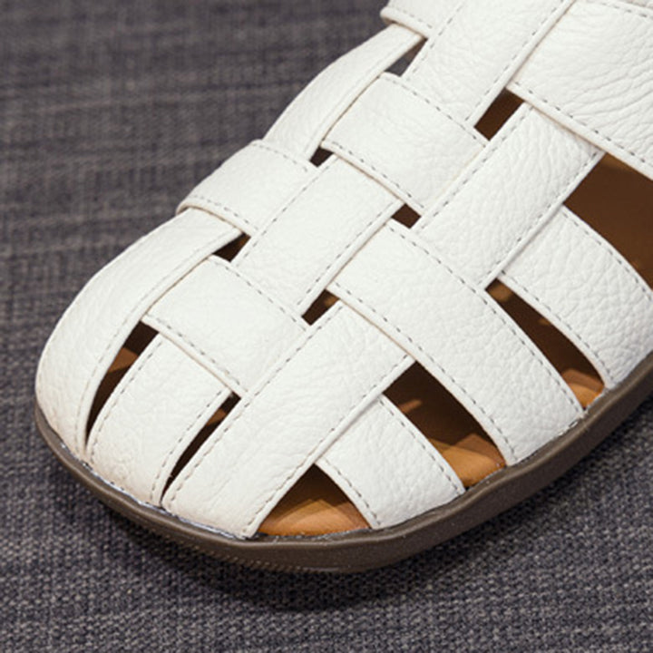 white Women's leather woven fisherman sandals