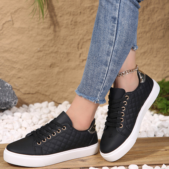 black Women's quilted lace-up platform sneakers