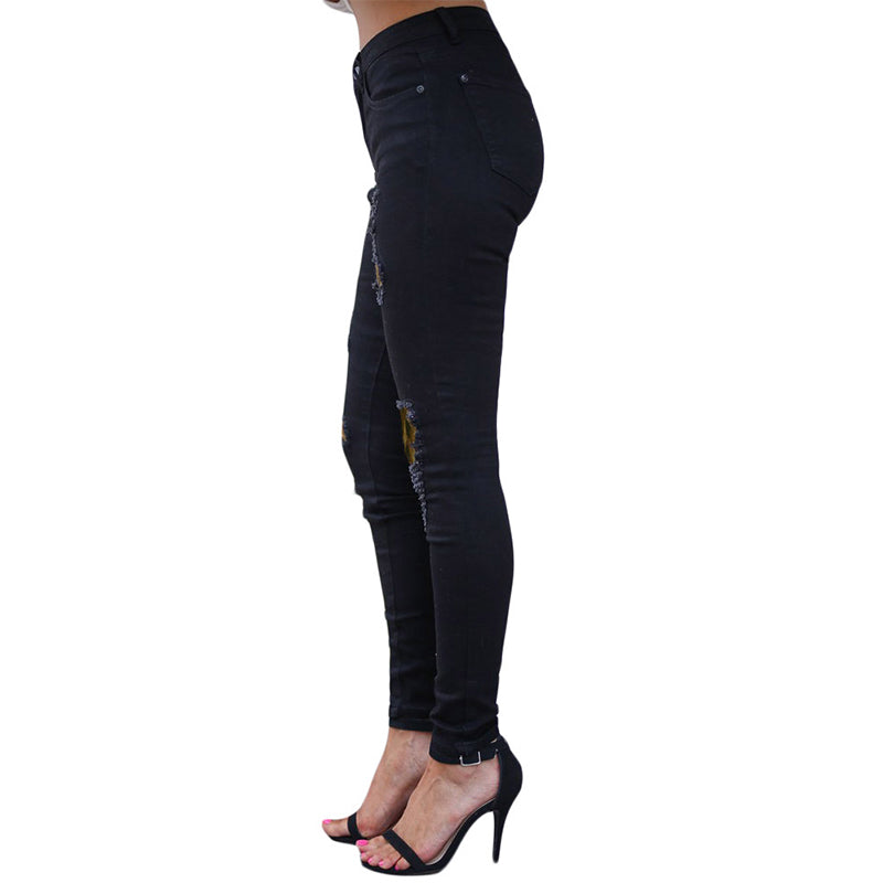 Women's distressed ripped skinny jeans