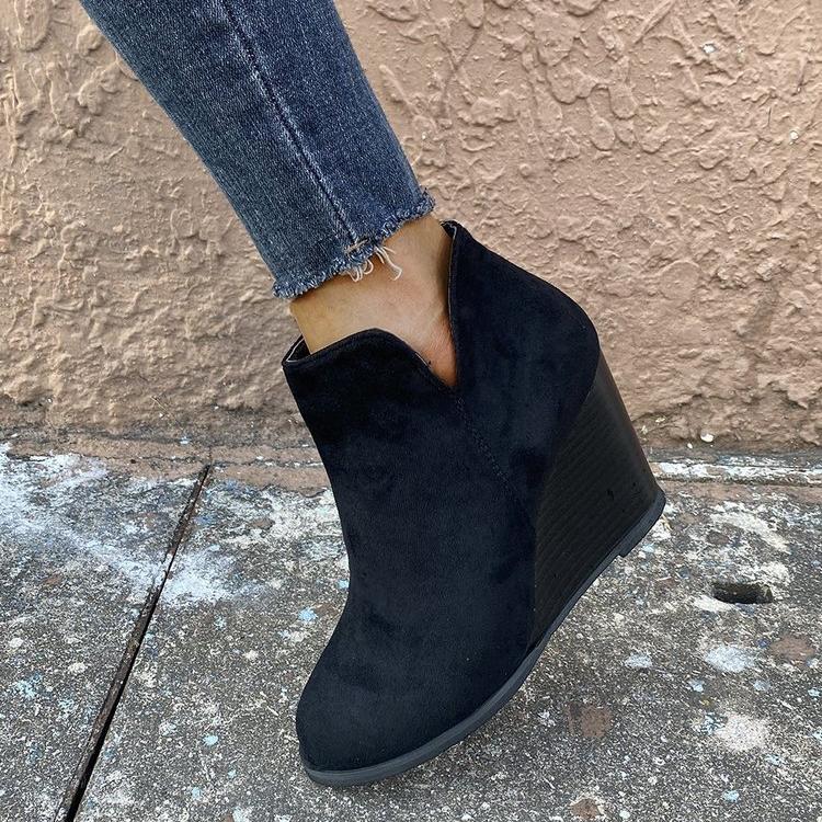 Women's side cut slip on wedge heel booties