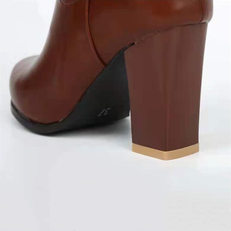 Brown chunky high heel knee high dress boots
