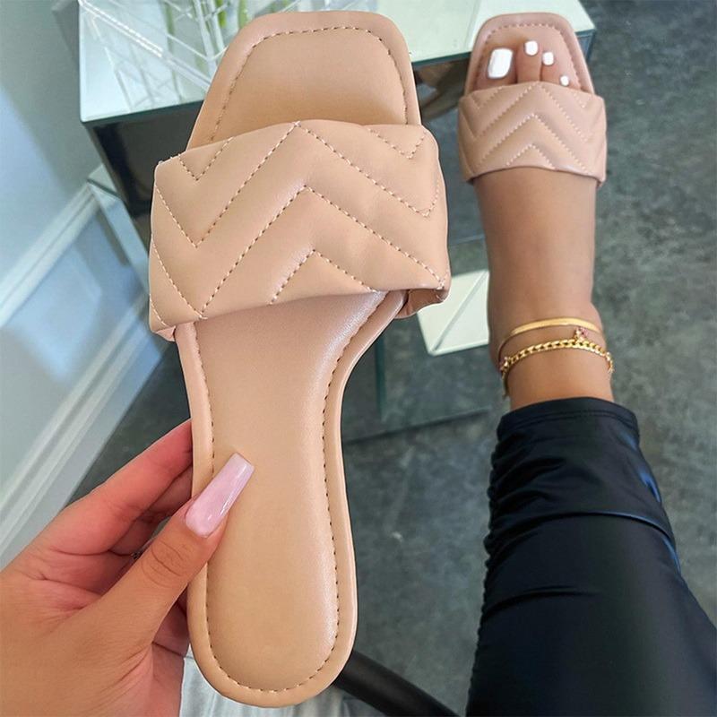 Women's flat quilted slide sandals